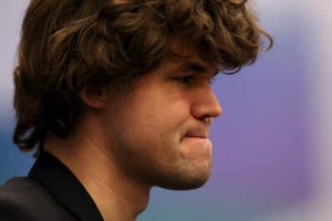 Chess Sensation: Nine-Year-Old Indian Prodigy Holds Magnus Carlsen to Draw in Online Tournament
OR
Chess World Stunned: 9-Year-Old Indian Player Draws Against Magnus Carlsen; Carlsen Reaches Unprecedented Freestyle Chess Rating