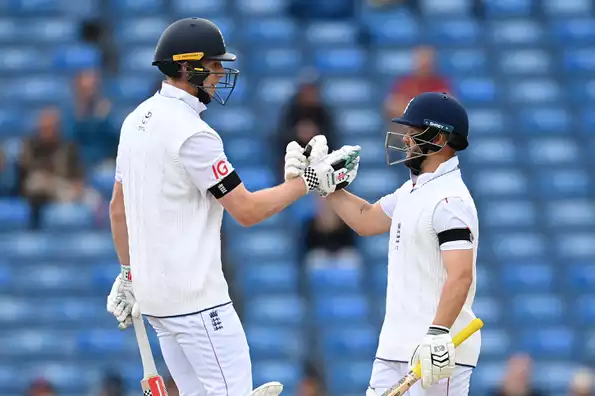 England's openers celebrate a solid partnership.