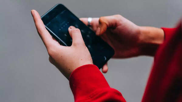 Using two hands and thumbs suggests energy and adaptability.