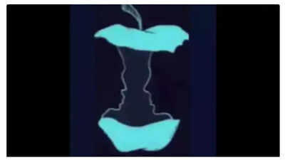 A visual puzzle featuring an apple core and two faces.