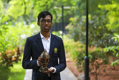 Chess grandmaster Praggnanandhaa being congratulated in Chennai.